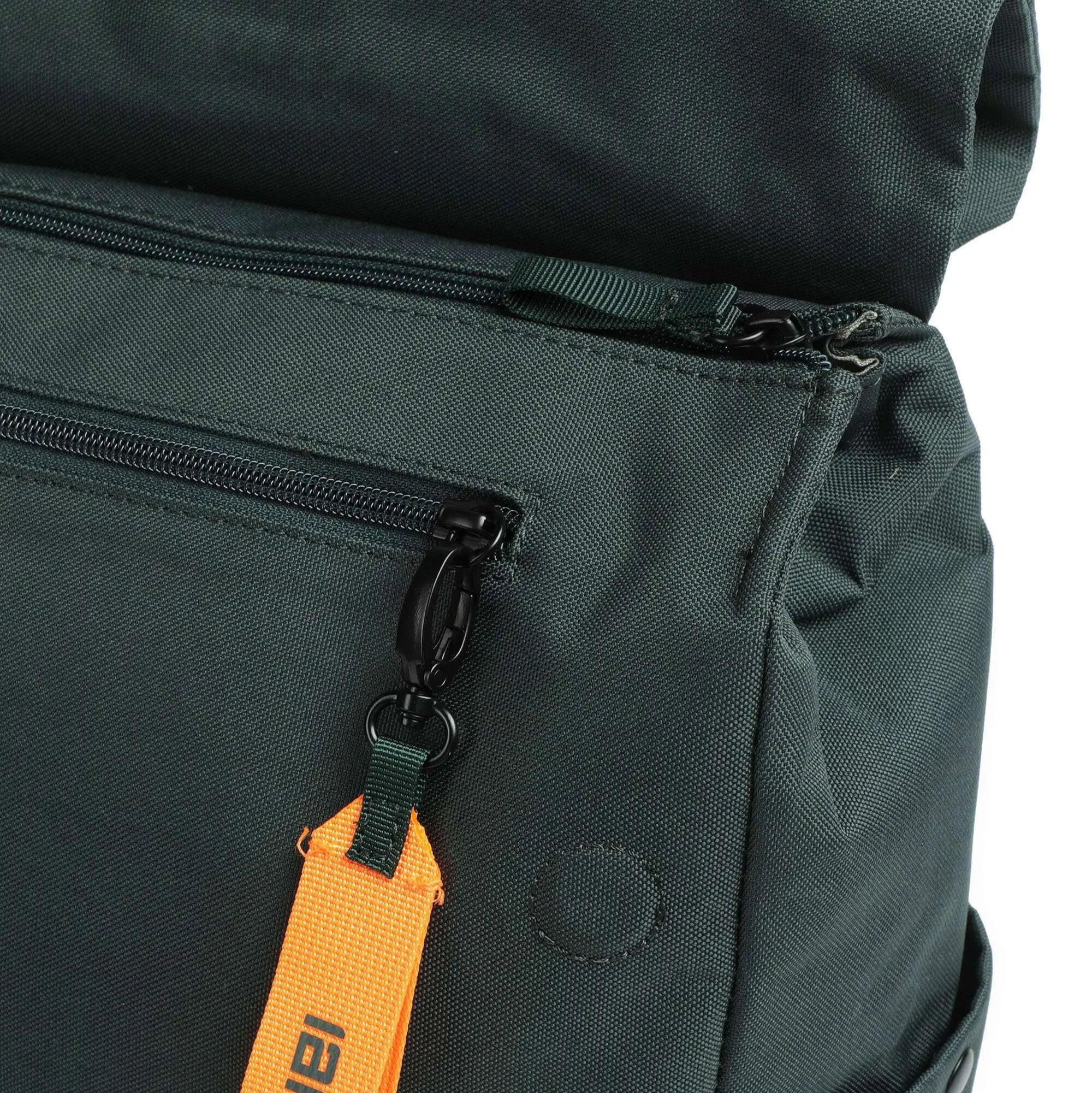 Close-up of a dark green backpack with an orange tag featuring 'Beezix' branding.